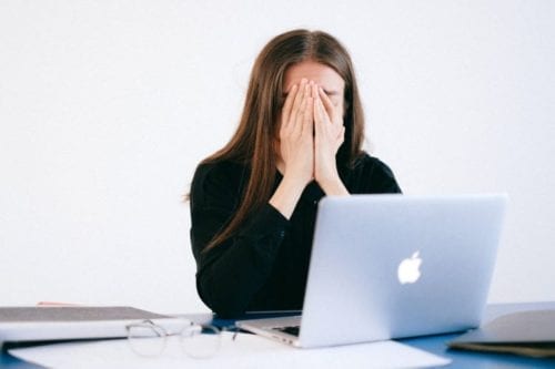 woman stressed in office